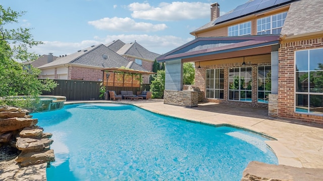 2026 Spindletop Trl, Frisco, TX 75033 - view of swimming pool featuring a patio, a pool with connected hot tub, and fence