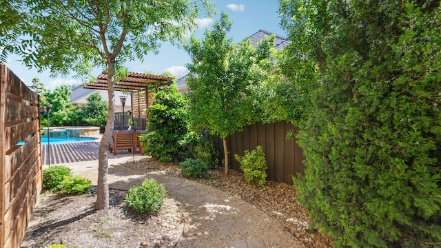 2026 Spindletop Trl, Frisco, TX 75033 - fenced backyard with a pergola