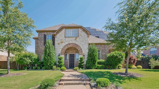 2026 Spindletop Trl, Frisco, TX 75033 - french provincial home with brick siding, stone siding, and roof with shingles