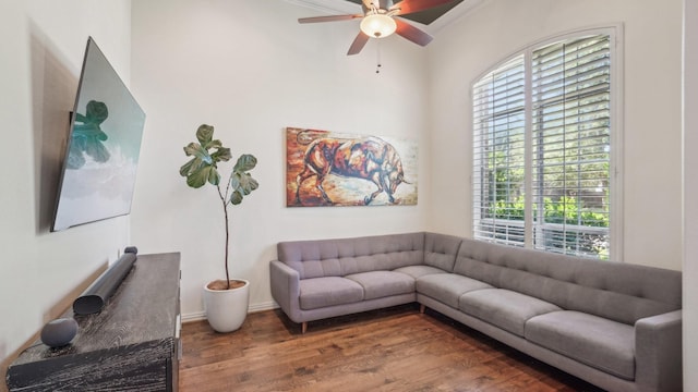 2026 Spindletop Trl, Frisco, TX 75033 - living room with wood finished floors, a ceiling fan, and crown molding
