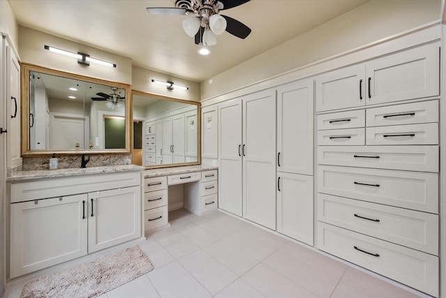 1111 Governors Dr, Corsicana, TX 75110 - bathroom with ceiling fan, tile patterned floors, vanity, and recessed lighting