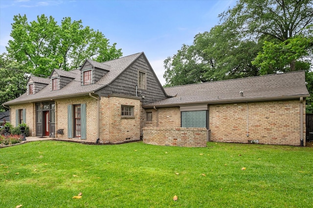 1111 Governors Dr, Corsicana, TX 75110 - view of front facade with brick siding, a front yard, and roof with shingles