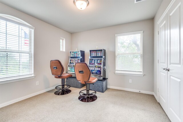 carpeted office with baseboards