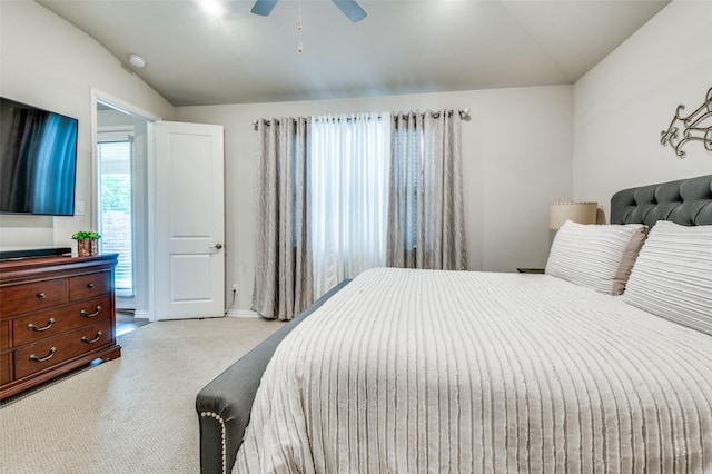 bedroom featuring lofted ceiling, carpet, ceiling fan, and baseboards
