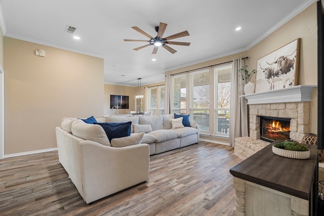 11448 Brook Green Ln, Haslet, TX 76052 - living area featuring ceiling fan, wood finished floors, crown molding, recessed lighting, and a fireplace