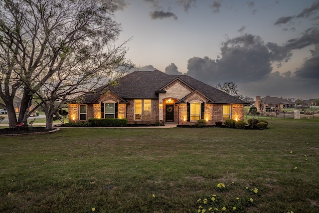 11448 Brook Green Ln, Haslet, TX 76052 - view of front of house with stone siding, brick siding, and a shingled roof
