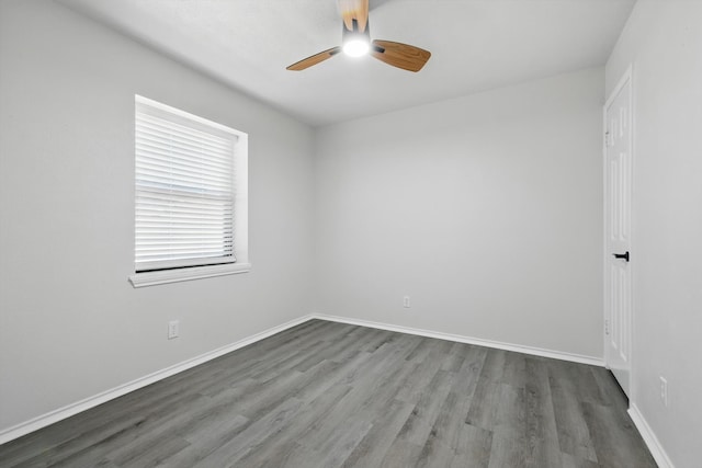 2755 Harbinger Ln, Dallas, TX 75287 - empty room featuring a ceiling fan, wood finished floors, and baseboards