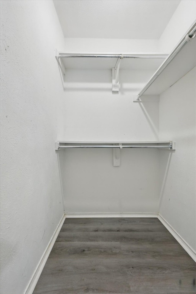 2755 Harbinger Ln, Dallas, TX 75287 - spacious closet with wood finished floors