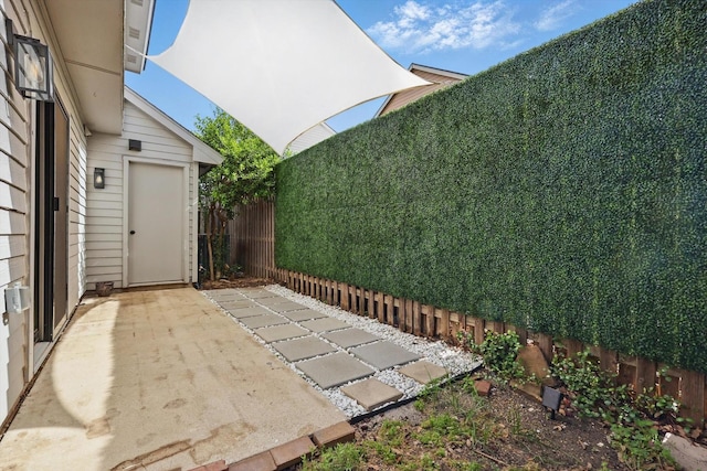 2755 Harbinger Ln, Dallas, TX 75287 - view of patio featuring a fenced backyard