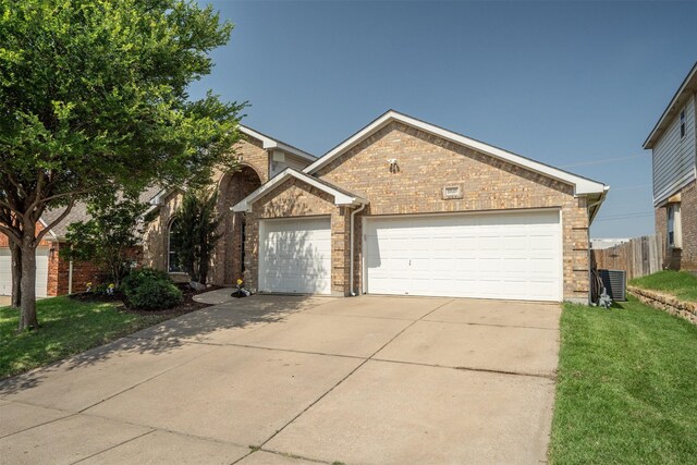 10149 Red Bluff Ln, Fort Worth, TX 76177 - traditional-style house with brick siding, a garage, driveway, and central AC unit