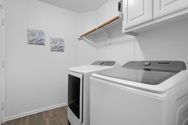 10149 Red Bluff Ln, Fort Worth, TX 76177 - laundry room featuring cabinet space, separate washer and dryer, baseboards, and dark wood-type flooring