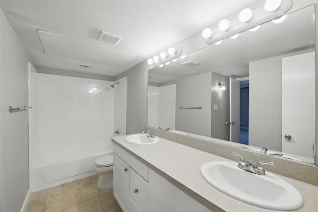 4620 Carr St, The Colony, TX 75056 - full bathroom with toilet,  shower combination, double vanity, tile patterned flooring, and a textured ceiling