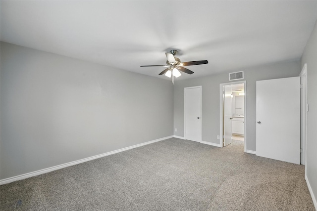 4620 Carr St, The Colony, TX 75056 - unfurnished bedroom with carpet flooring, baseboards, ensuite bathroom, and ceiling fan