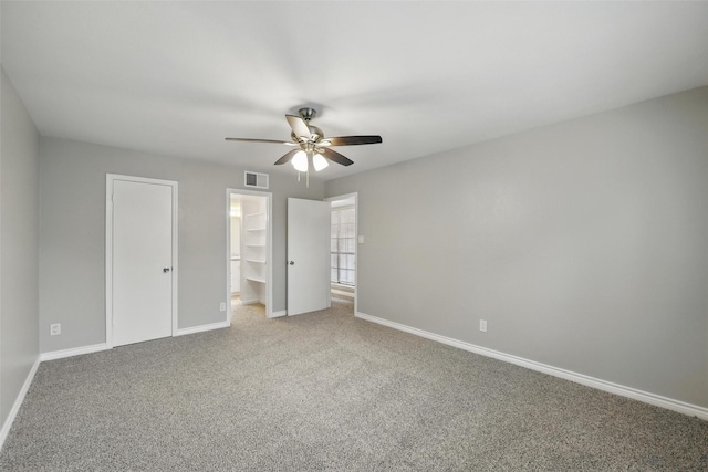 4620 Carr St, The Colony, TX 75056 - unfurnished bedroom with light colored carpet, baseboards, a ceiling fan, and ensuite bath