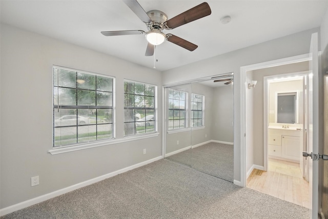 4620 Carr St, The Colony, TX 75056 - unfurnished bedroom featuring light carpet, baseboards, a closet, and ceiling fan