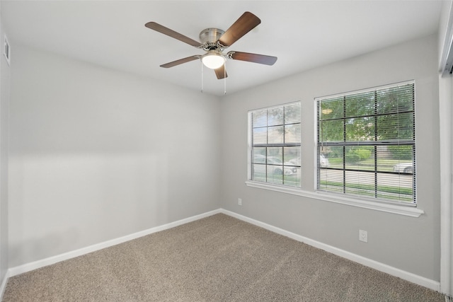4620 Carr St, The Colony, TX 75056 - spare room featuring carpet flooring, baseboards, and a ceiling fan