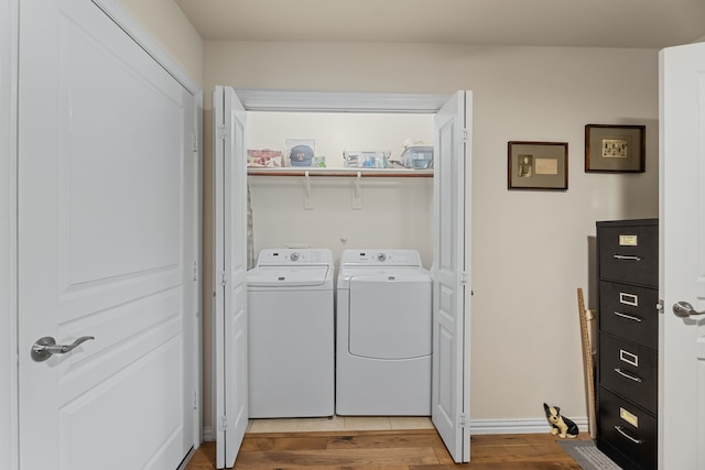 1316 Shinnecock Ct, Fairview, TX 75069 - clothes washing area featuring separate washer and dryer, wood finished floors, and baseboards