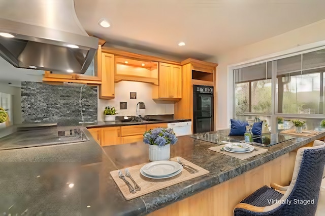 321 Evangeline Dr, Elm Grove, LA 71051 - kitchen with exhaust hood, a sink, light brown cabinetry, dark countertops, and a breakfast bar