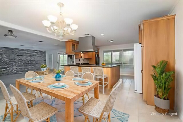 321 Evangeline Dr, Elm Grove, LA 71051 - dining room with healthy amount of natural light, a chandelier, recessed lighting, and light tile patterned floors