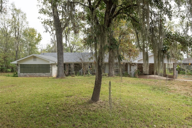 321 Evangeline Dr, Elm Grove, LA 71051 - view of grassy yard featuring a patio
