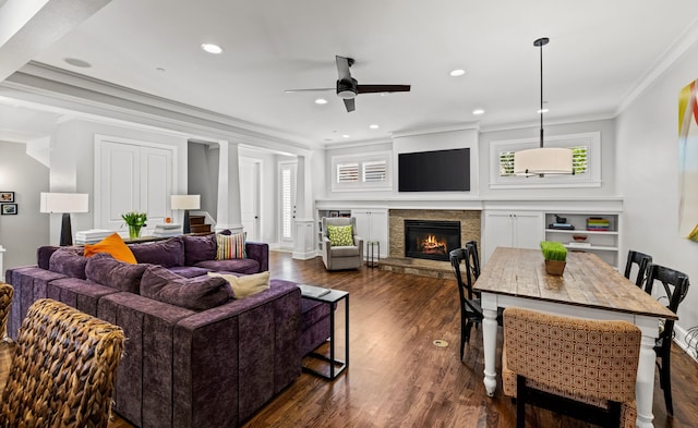 4144 Emerson Ave Unit 2, University Park, TX 75205 - living room featuring crown molding, ceiling fan, a stone fireplace, dark wood-style flooring, and recessed lighting