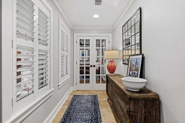 4144 Emerson Ave Unit 2, University Park, TX 75205 - entryway featuring french doors, ornamental molding, and light tile patterned flooring