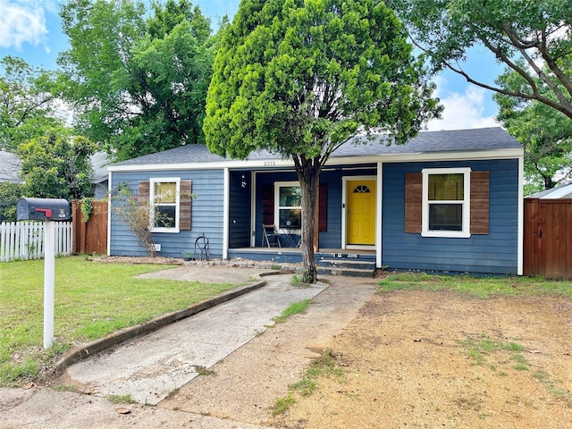 2315 Boyd St, Dallas, TX 75224 - view of front of house featuring a porch and roof with shingles