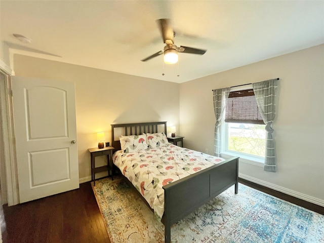2315 Boyd St, Dallas, TX 75224 - bedroom with baseboards, wood finished floors, and ceiling fan