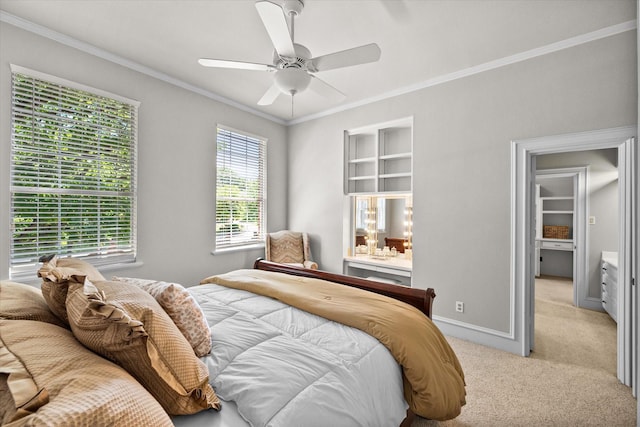 bedroom with light carpet, crown molding, a ceiling fan, and baseboards