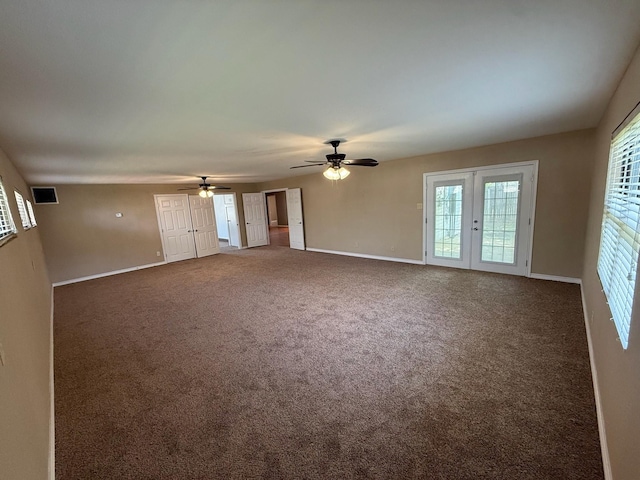 2325 S 40th St, Abilene, TX 79605 - unfurnished living room featuring baseboards, a ceiling fan, carpet, and french doors
