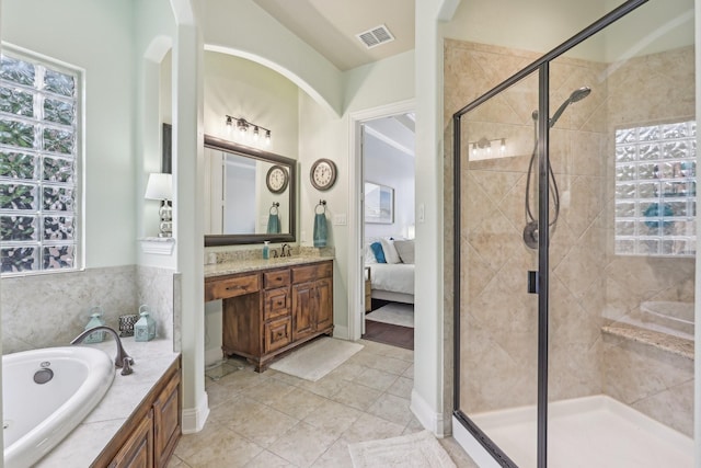 2515 Trophy Club Dr, Trophy Club, TX 76262 - ensuite bathroom with a stall shower, a bath, vanity, and tile patterned floors