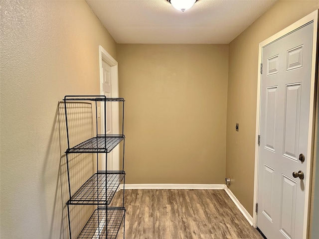 213 W Tennie St, Gainesville, TX 76240 - interior space featuring wood finished floors and baseboards