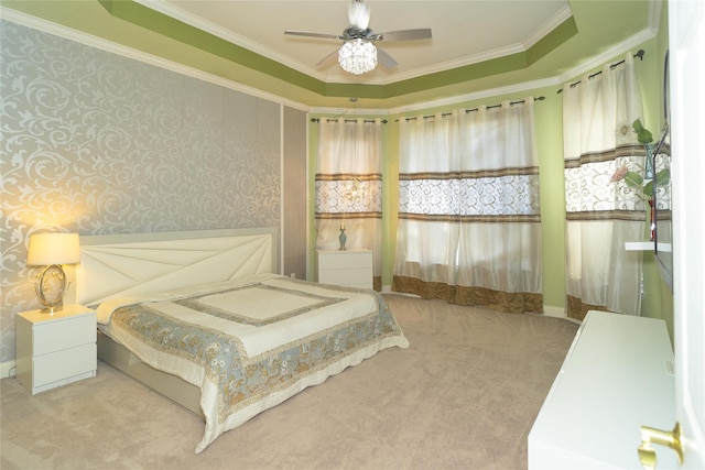 bedroom with wallpapered walls, carpet, ornamental molding, and ceiling fan