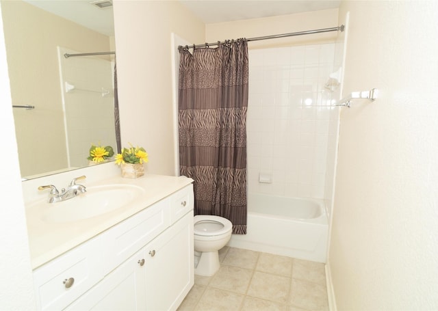 bathroom featuring toilet, shower / bathtub combination with curtain, vanity, and tile patterned flooring