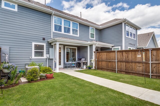 6628 Kort St, Rowlett, TX 75089 - back of property with a patio and central AC unit