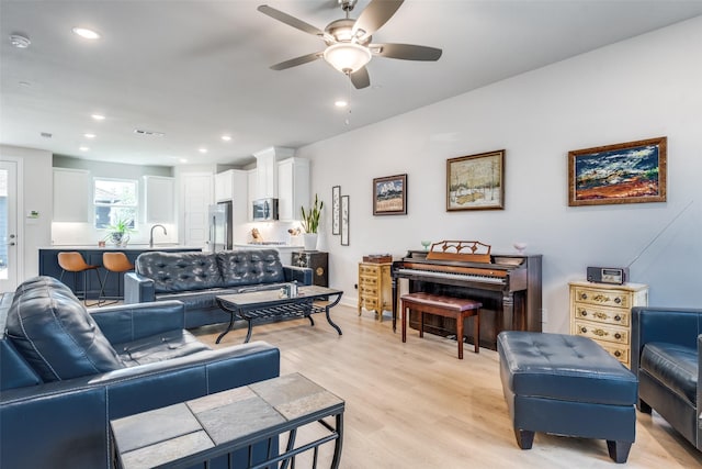 6628 Kort St, Rowlett, TX 75089 - living area featuring ceiling fan, light wood-style flooring, and recessed lighting