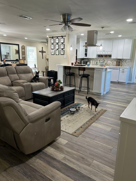 5004 Blackstone Dr, River Oaks, TX 76114 - living area with light wood-style floors, recessed lighting, and a ceiling fan