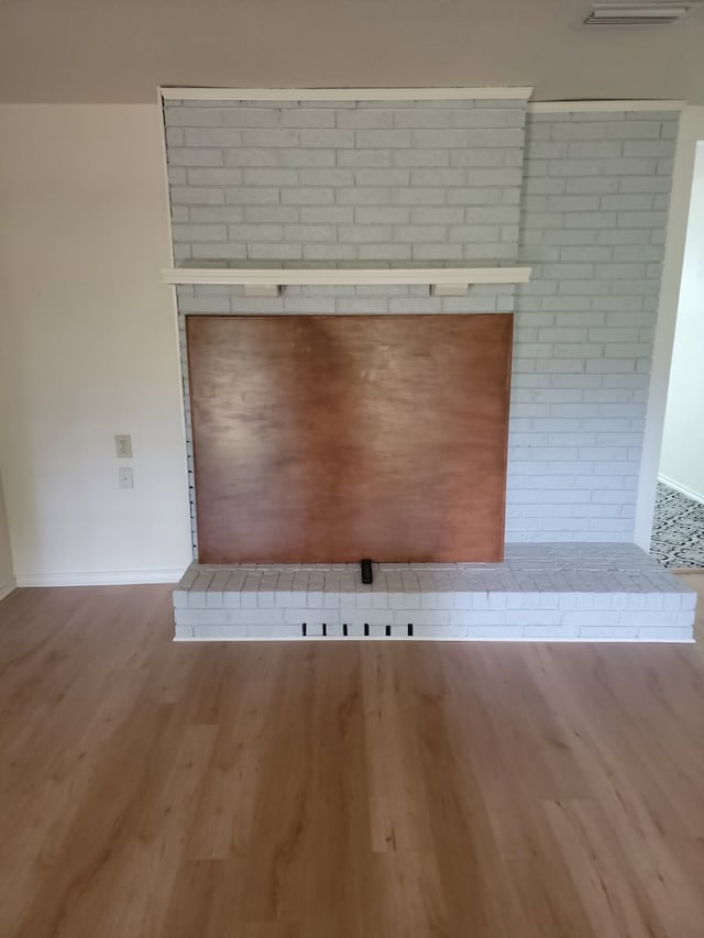 2508 Oak Manor Ct, Arlington, TX 76012 - detailed view of baseboards and wood finished floors