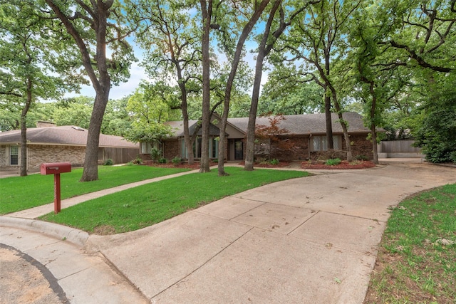 2508 Oak Manor Ct, Arlington, TX 76012 - view of front of home with brick siding, concrete driveway, and a shingled roof