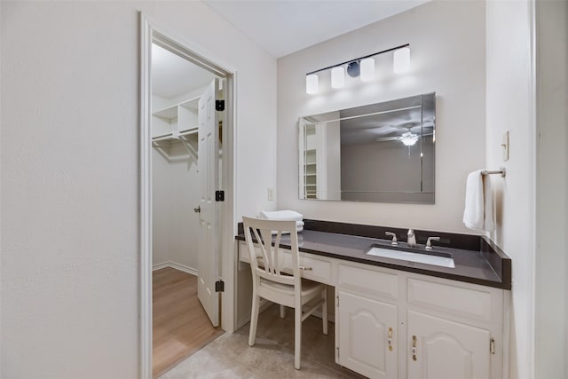 2508 Oak Manor Ct, Arlington, TX 76012 - bathroom featuring vanity and ceiling fan