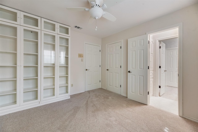 2508 Oak Manor Ct, Arlington, TX 76012 - unfurnished bedroom featuring carpet floors and ceiling fan