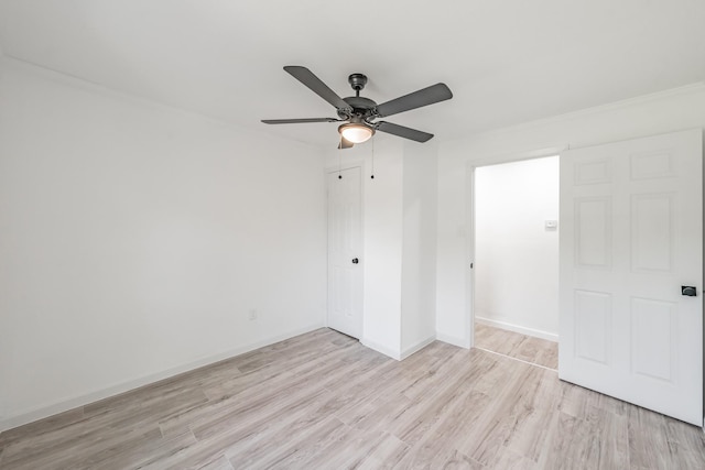 238 Briar Oaks Dr, Azle, TX 76020 - unfurnished bedroom with light wood-style floors, a closet, baseboards, ceiling fan, and crown molding