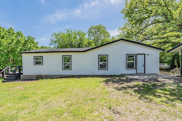 238 Briar Oaks Dr, Azle, TX 76020 - rear view of property featuring a lawn