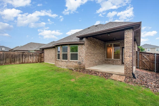 413 Allbright Rd, Celina, TX 75009 - back of property featuring a patio area, brick siding, and roof with shingles