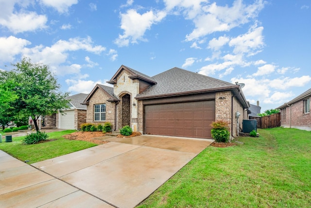 413 Allbright Rd, Celina, TX 75009 - view of front of property with an attached garage, a shingled roof, brick siding, and central AC unit