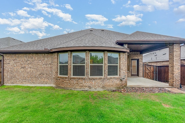 413 Allbright Rd, Celina, TX 75009 - back of house with a shingled roof, brick siding, and a patio area