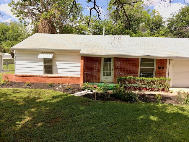 909 Hallum St, River Oaks, TX 76114 - single story home with brick siding, a front lawn, a garage, and roof with shingles