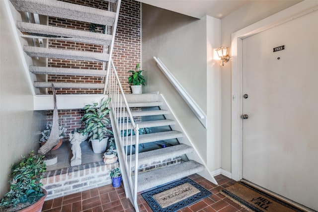 stairway with baseboards