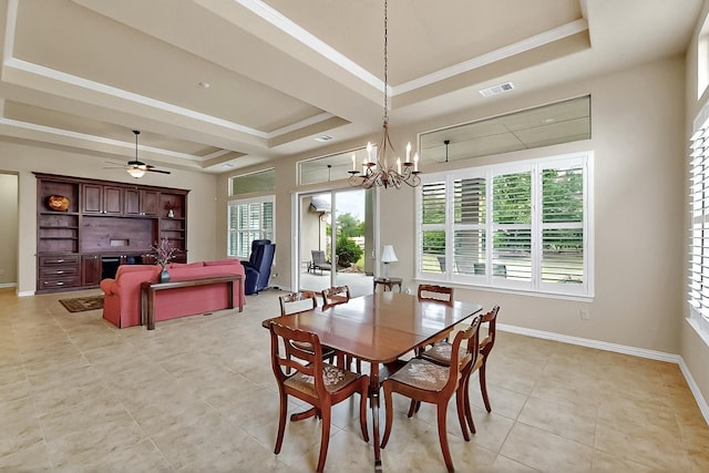 11908 Glenbrook St, Denton, TX 76207 - dining space with a tray ceiling, light tile patterned floors, ornamental molding, baseboards, and a chandelier
