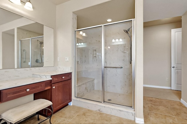 11908 Glenbrook St, Denton, TX 76207 - bathroom featuring tile patterned flooring, a stall shower, and vanity